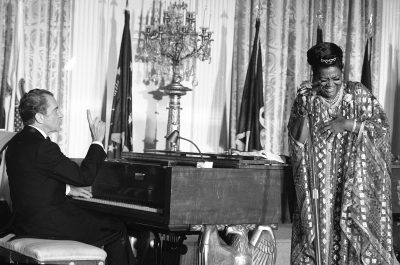 In this March 8, 1974, file photo President Nixon plays