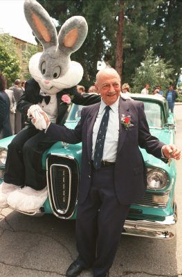 Mel Blanc poses with Bugs Bunny at his 80th birthday party in Los Angeles, June 2, 1988. (AP Photo)
