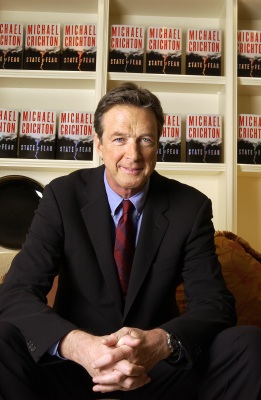 Author Michael Crichton poses at The Peninsula Hotel in New York, Dec. 7, 2004. (AP Photo/Jim Cooper)