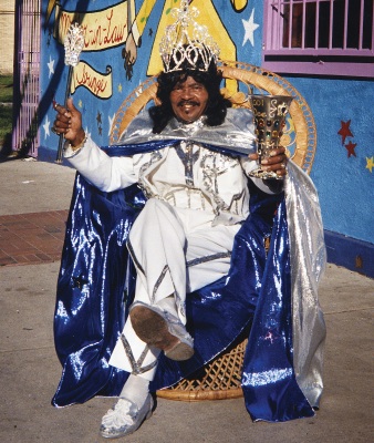 In this 2001 image released by The Historic New Orleans Collection, Ernie K-Doe poses outside of his Mother-In-Law Lounge during Jazz Fest in New Orleans. A new book published by the Historic New Orleans Collection,