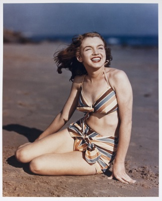 In this 1946 file image taken by photographer Joseph Jasgur and released by Julien's Auctions, Norma Jean Dougherty, who eventually changed her name to Marilyn Monroe, is shown. Copyrights and images from Marilyn Monroe's first photo shoot sold for $352,000 at Julien's Auctions after a bankruptcy judge in Florida ruled that photos taken of Monroe were to be sold at auction in Dec. 2011 to settle the debts of the photographer. (AP Photo/Julien's Auctions, Joseph Jasgur, File)