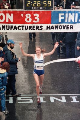 In an Oct. 23, 1983 file photo Grete Waitz , of Norway, crosses the finish line to win the New York City marathon. Waitz broke the tape with a time of 2:26:59. Grete Waitz, who won nine New York City Marathons and a silver medal at the 1984 Olympics, died Tuesday April 19, 2011 after a six-year battle with cancer, Norway's athletics federation said. She was 57. (AP Photo/file)