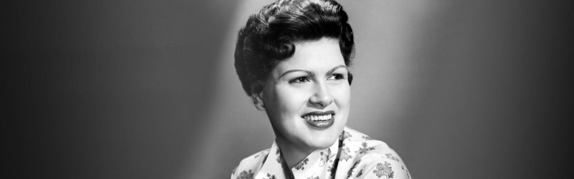 Patsy Cline was a country music star known for multiple hits like "Walkin After Midnight"